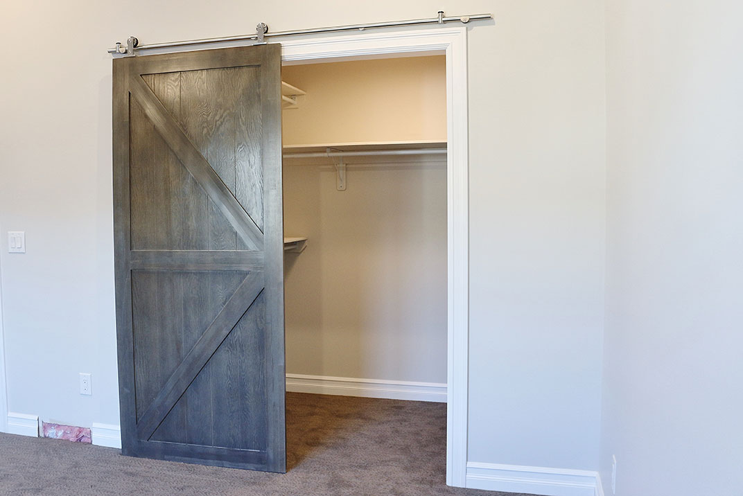 Master-Bedroom with Barn Doors to Walk-in Closet