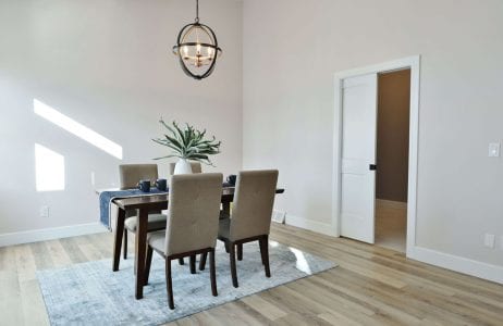 Formal Dining Room with natural light through the garden doors